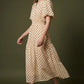 Polkadots dress in ivory